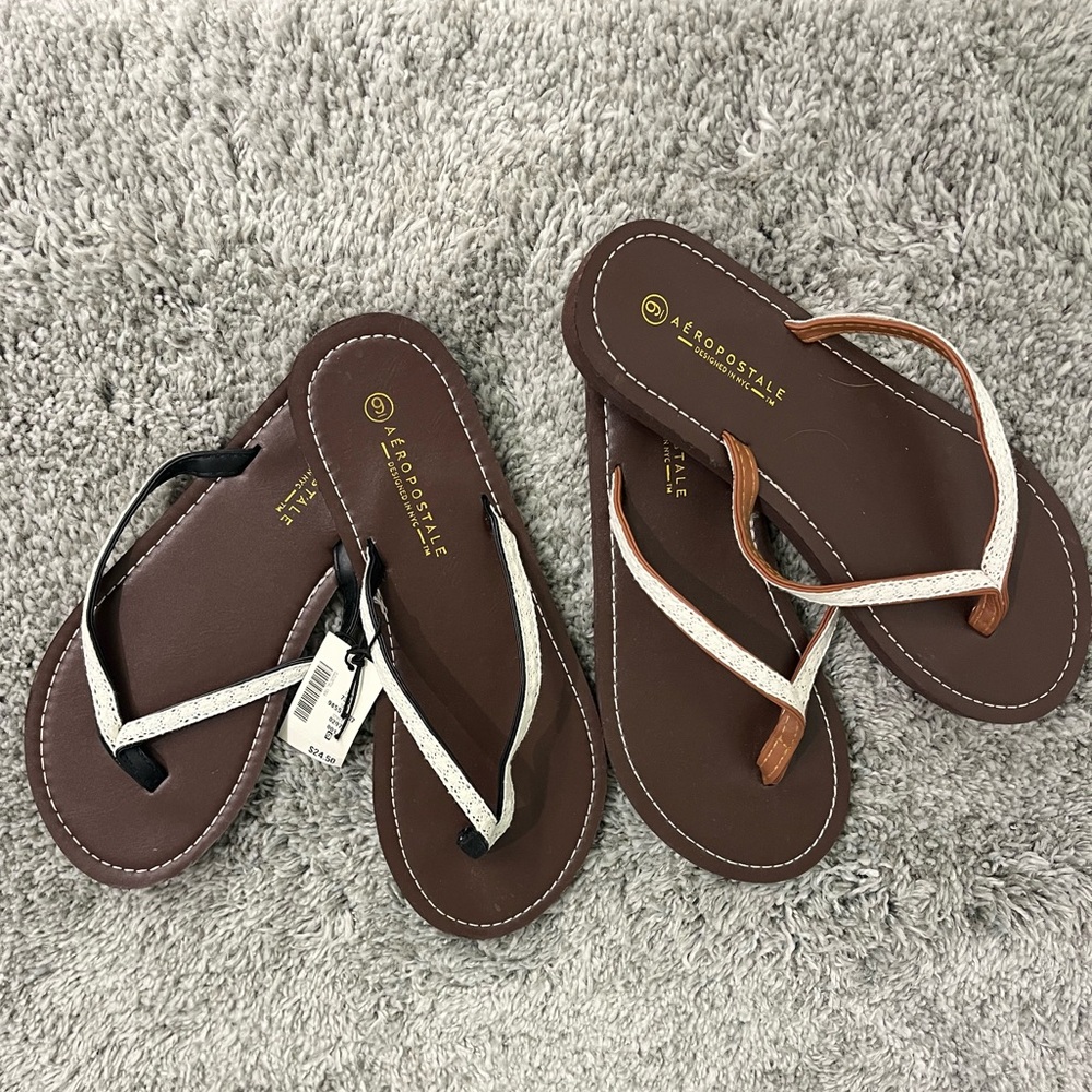 Brand New set of 2 Aeropostale leather flip flops with lace trim.